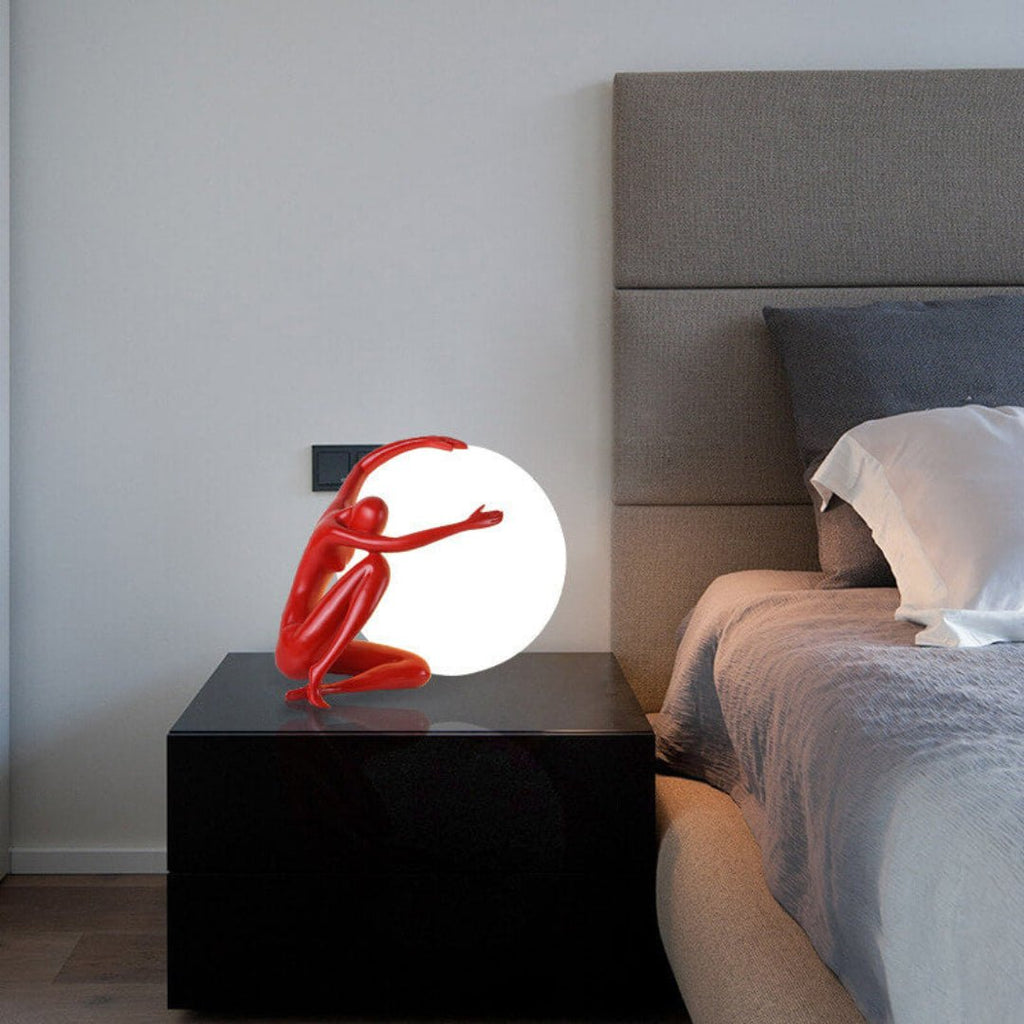 Humanoid Ball Holding Table Lamp Table lamp