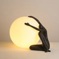 Humanoid Ball Holding Table Lamp ∅ 13.4″ x H 8.7″ / Dia 34cm x H 22cm / Black / US Plug Table lamp