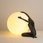 Humanoid Ball Holding Table Lamp ∅ 13.4″ x H 8.7″ / Dia 34cm x H 22cm / Black / US Plug Table lamp