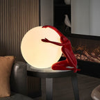 Humanoid Ball Holding Table Lamp Table lamp