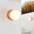 Asteroid Wall Light ∅ 6.3″ x H 6.3″ / Yellow Travertine & White / Warm Light Wall lamp