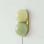 Two Globe Glass Plug-in Wall Sconce
