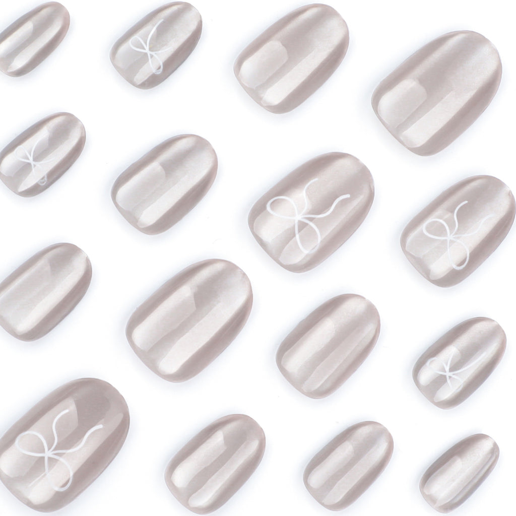 StarNagel Round Nails in Hochwertigem Grau mit Cat Eye Effekt und Einfachem Einfarbigen Design sowie Schleifen