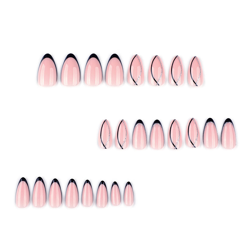 StarNagel Almond Nägel in Nude mit Schwarzem French, Glitzerlinien und Nageldesign