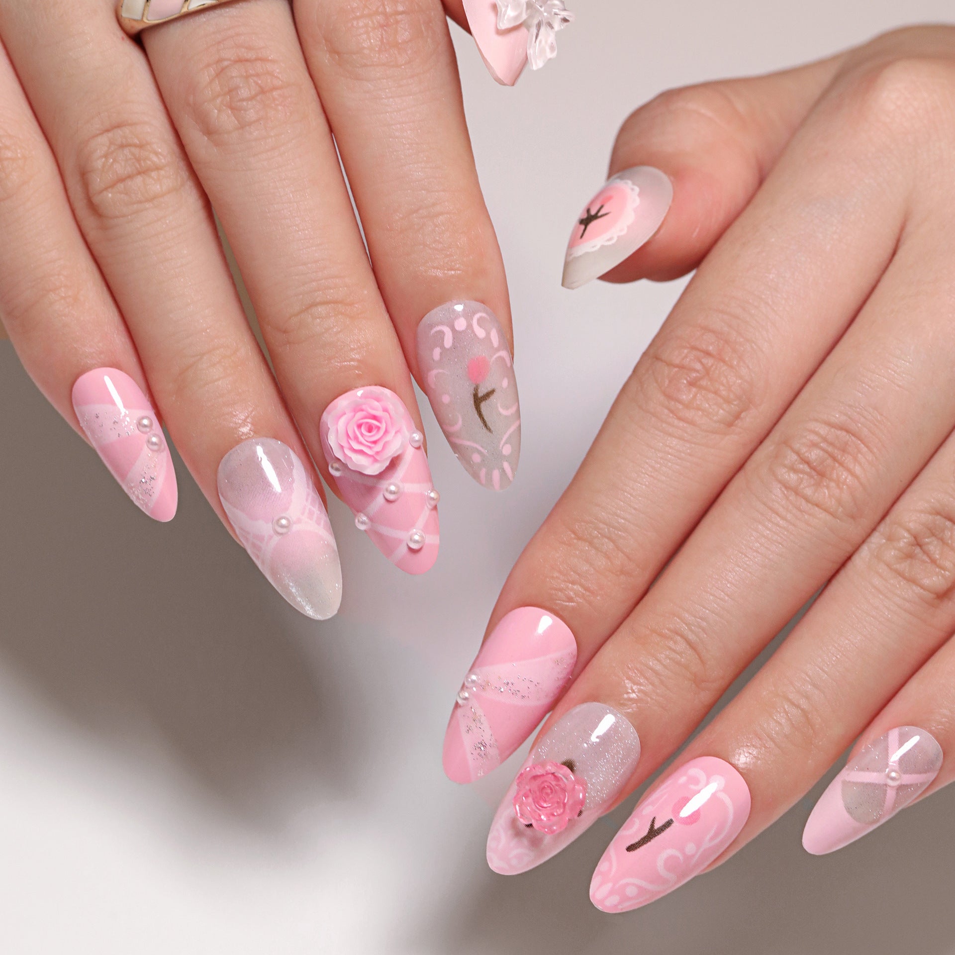 StarNagel Almond Nägel in Rosa mit 3D-Blumen, Tulpen und Schleifen