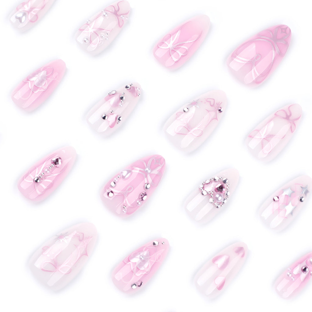 StarNagel Almond Nägel in Rosa mit Herzchen, Schleifen und Strasssteinen