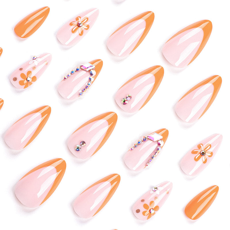 StarNagel Almond Nägel in Orange mit French, Blumenmotiv und Strasssteinen
