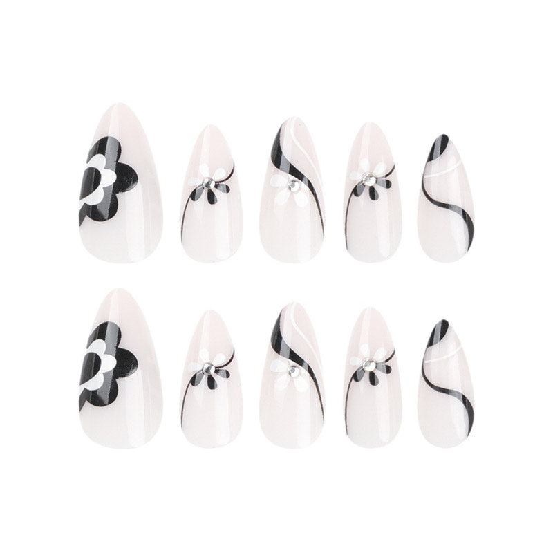 StarNagel Almond Nägel in Schwarz-Weiß mit Blumenmuster und Schwarzen Streifen