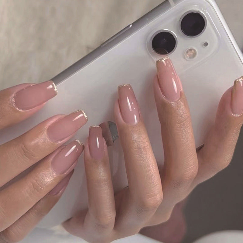 StarNagel Ballerina Nägel in Rosa mit Goldglitzer und Haar-Accessoire Look – Elegant