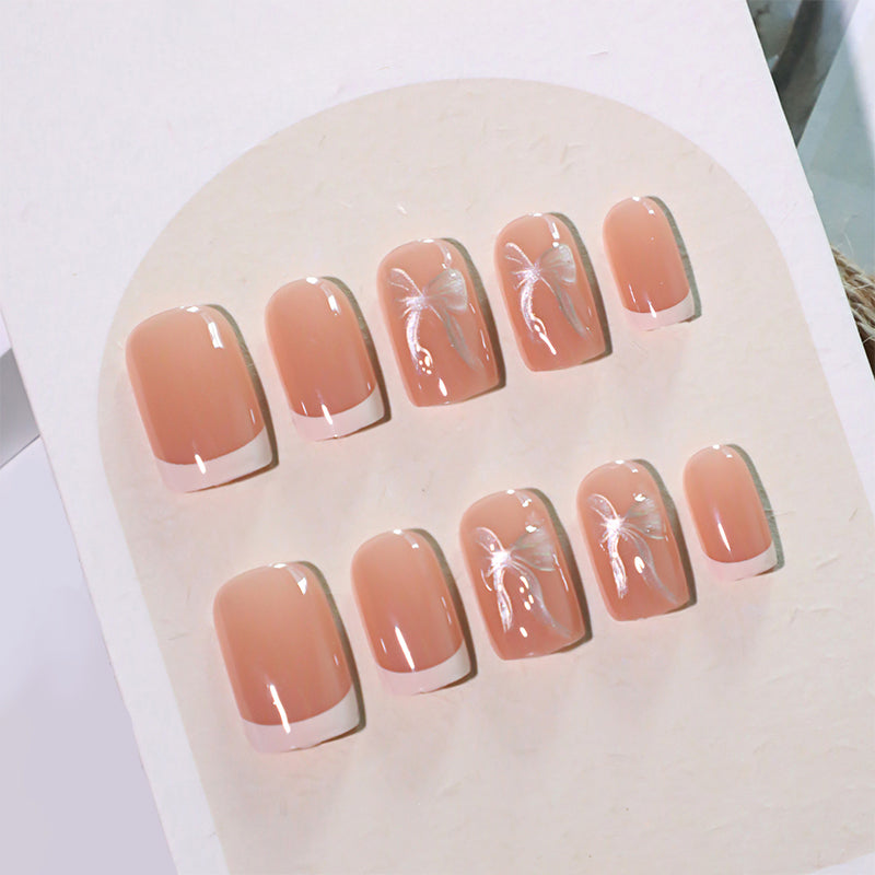 StarNagel Ballerina Nägel mit Sanftem Gelbem French und Goldenen Schleifen