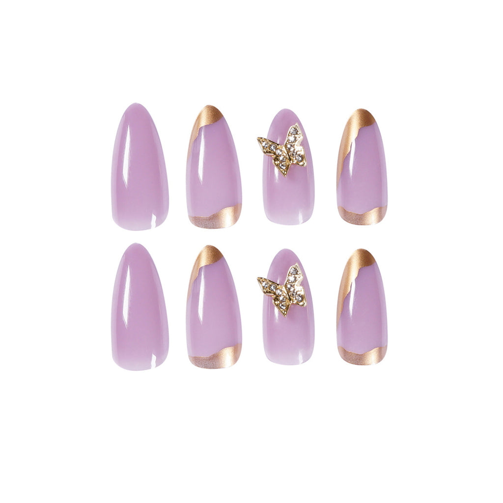 StarNagel Stiletto Nägel mit lila und goldenen Rändern sowie 3D-Schmetterlingen